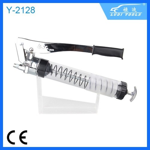 Transparent grease gun for excavator parts