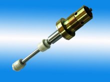 Spindle for menegatto covering machine