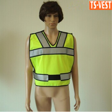 Yellow reflective tape running safety vests at outdoors