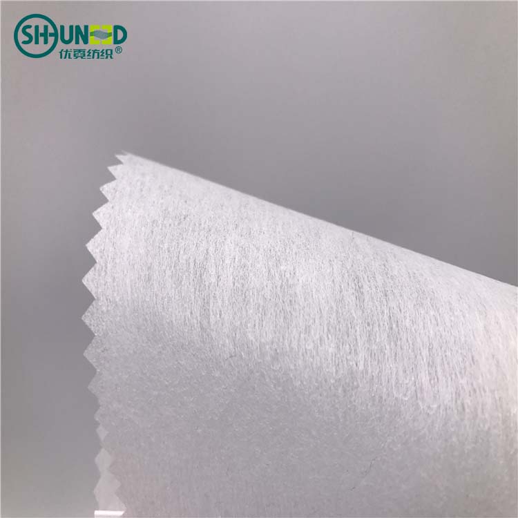 Chinese hot sell SGS high quality 100% polyester LDPE fusible cut away embroidery backing paper soft garment nonwoven fabric