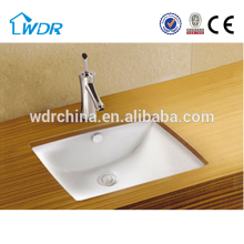 White ceramic sanitary washroom wash counter basin