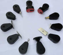 Retractors and Tethers for Retail Store Displays