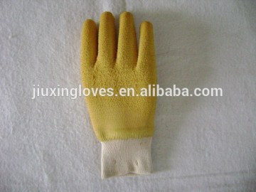 Yellow latex coated cotton gloves