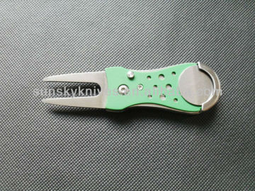 Golf divot tool with money clip