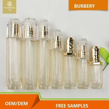 Bottiglie e bottiglie cosmetiche di vetro ottagonale trasparenti dorate