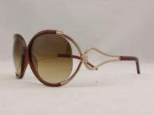Narciso 524s 68f Roberto Cavalli Sun Glasses For Women Transparent Red Mix Gold Frame Brown Gradient Lens