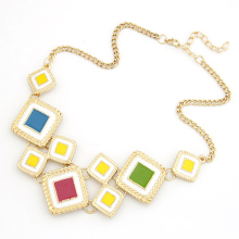 Various square connected gold choker necklace.