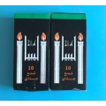 White stick wax candle in black box