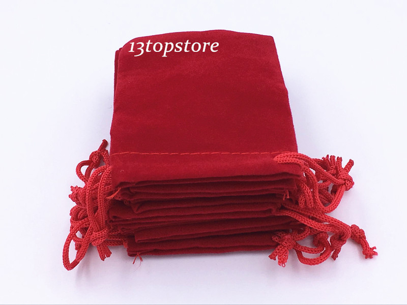 Red velvet jewelry pouch with red string 