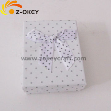 Lovely retail jewelry paper box with a bow