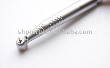 Self-generating fibre optic DENTAL handpiece