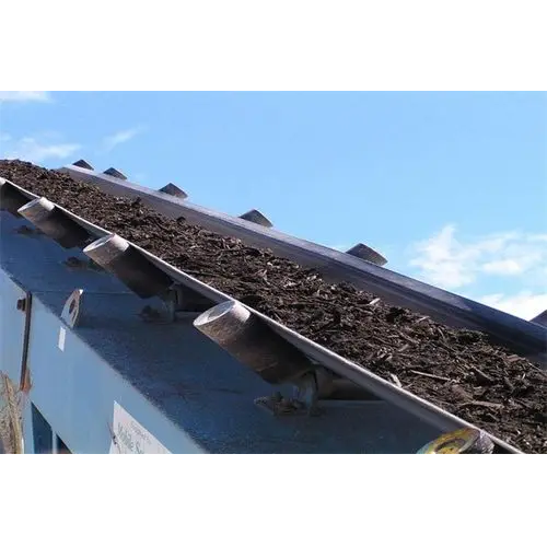 Self cleaning conveyor belt