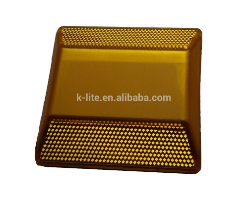 Yellow mounted surface road stud