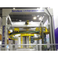 High speed rotary ring wrapping machine