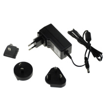 12V 1.5A entèrchanjabl ploge tablèt adaptè