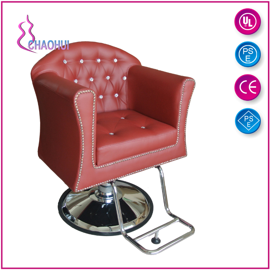 Adjustable barber chair with footrest