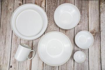 Reactive glazed stoneware dinner set in Creamy white