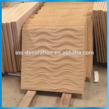 Hand carved cement wall art