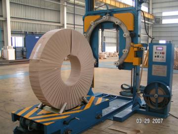 Pneumatic pipe wrapping machine