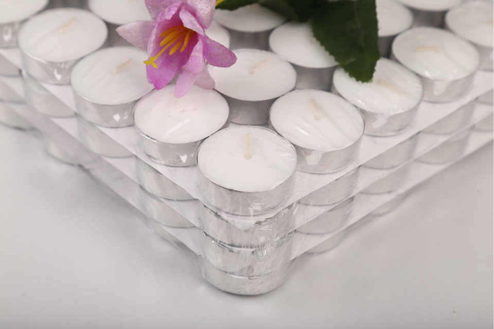 pouring decorative tealight scented candle