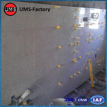 Tile adhesive in shower wall large tiles