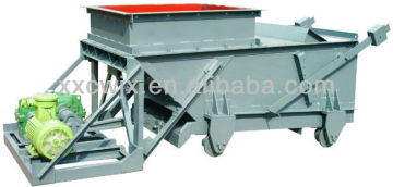 Reciprocating plate feeder