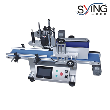 Desktop Labeling System for Round Bottles