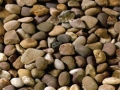 Polerad floden stenar för vägbeläggning