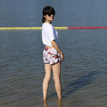 Nager à eau sèche rapide répulsif de natation féminine courte