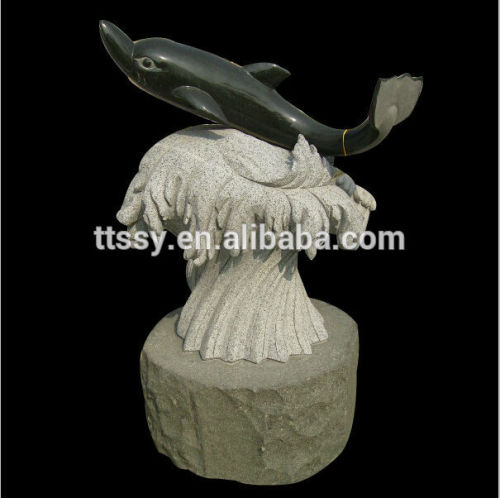 Dolphins stone carving