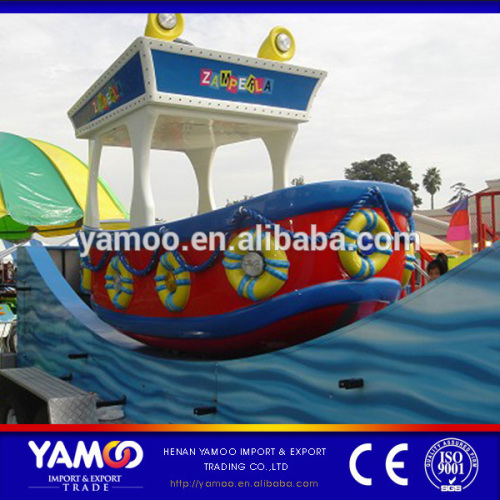 Factory thrilling kids small amusement rides rocking tug slide boat for sale