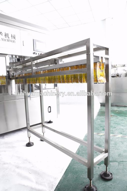 Automatic stand pouch spout pouch filling and packing machine capping machine