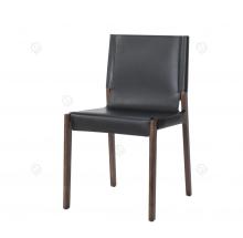 Black saddle leather armless wooden feet dining chairs