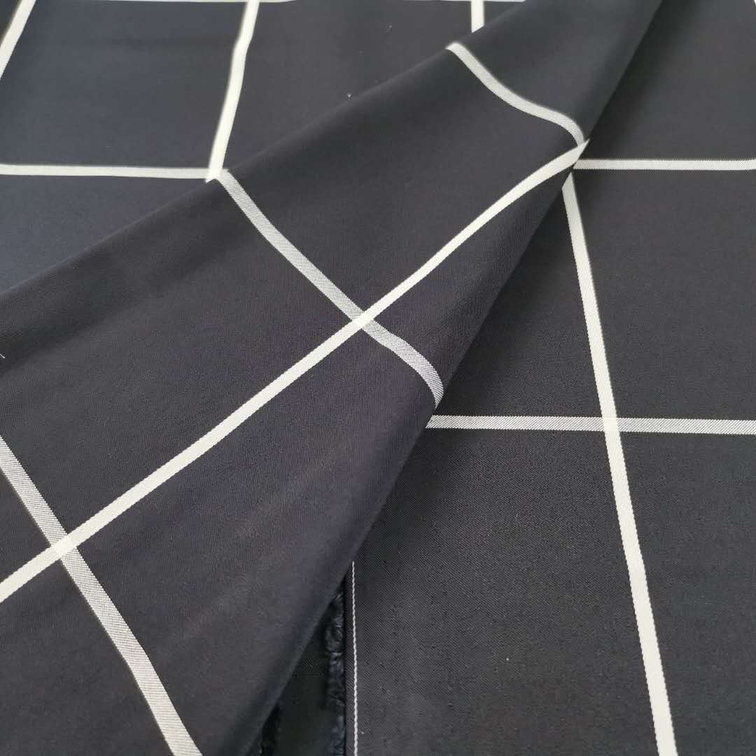 Satin Elasticity in All Directions Black background and white stripe in Yarn-dyed fabrics