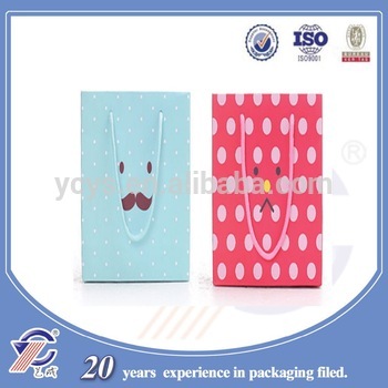 2015 fancy design cute facial expression printed gift paper package bag OEM are accepted