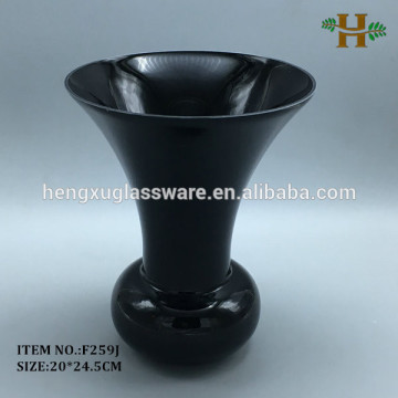black glass vase with trumpet opening