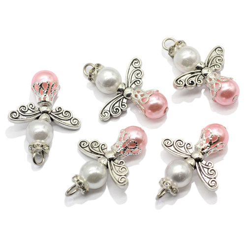 Venta al por mayor de abalorios de ala de aleación artificial con bonitas perlas artesanales, joyería de bricolaje, colgantes, accesorios para collar