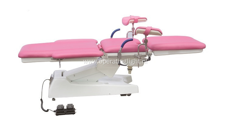 Red color gynecology table for obstetric examination