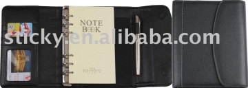 notebook with metal clip