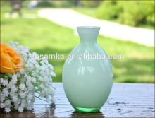 Small flower arrangement glass vase