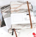 Notebook in pelle tagliata a riviste riciclate logo personalizzato