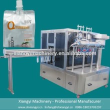 automatic stand up liquid filling capping machine/spout bag filling capping machine