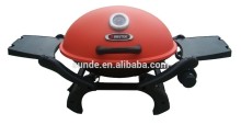 Orange Lid Round Gas BBQ Grill portable with foldable table