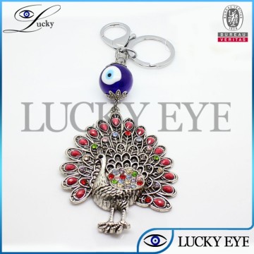 2014 fashion evil eye red agate peafowl key chain wholesale