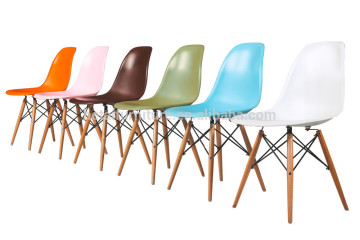 Plastic chair with wooden legs