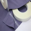 Hot melt adhesive film for non-marking garments