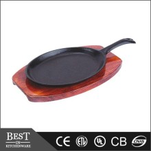 Oval sizzle platters w/ handle, Cast iron