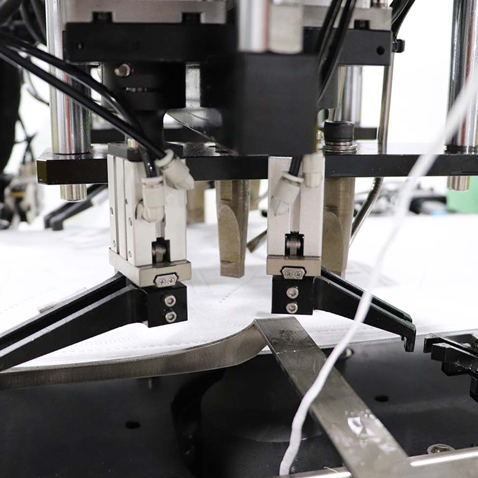 آلة صنع قناع النسيج غير المنسوج عالية الكفاءة