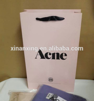 pink cloth and shoes packaging gift bag