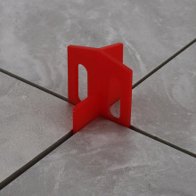 Tile positioning screed is desirable